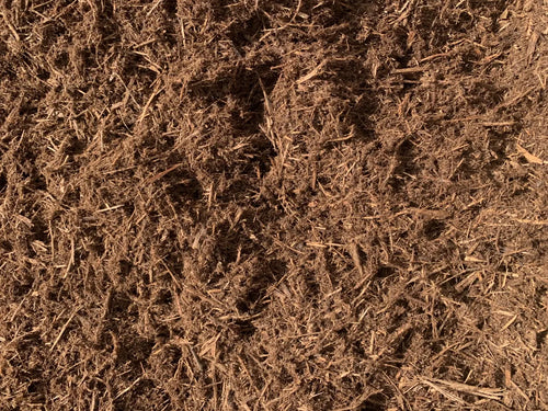 Double-grind cedar mulch texture sold by the cubic yard in Burnet, Texas